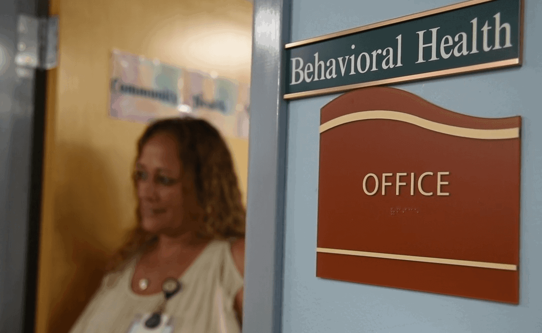 BHC in doorway of behavioral health office
